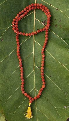 SMALLEST Very small and rare Rudraksha mala of 108+1 Hindu Puja prayer beads    Rudraksh is the sacred seed that literally means "The Eye of Lord Shiva". They have a brownish red, wrinkled appearance. When used while meditating, Rudraksh beads are believed to open the heart chakra, help lower blood pressure and create stability within the entire system Considered highly effective for - Heart Diseases and Blood pressure This Rudraksha mala is made with 5 faced Rudraksha beads. It is associated with electro-magnetic properties, which is good in controlling of blood pressure. It helps to release heat from the body thus good in relaxation Wearing of holy beads means ensuring good health as it is termed as the incarnation of God Shiva Spiritual Mala With 108 Beads For Blessing, Spiritual Gemstone Beads For Rituals, Holistic Hand Knotted Jewelry For Rituals, Spiritual Mala With Polished Beads For Healing, Spiritual Healing Mala With Polished Beads, Traditional Mala With Gemstone Beads For Healing, Traditional 108 Beads Mala For Healing, Spiritual Hand-strung Necklaces For Puja, Hand-strung Spiritual Necklace For Puja