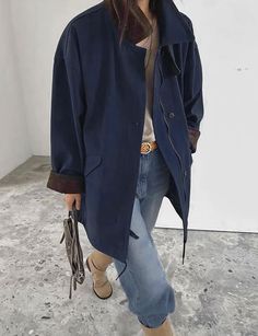 Navy oversized country jacket with brown corduroy contrast collar and sleeve cuff . Brand Pixie Market 100% cottonLined in 100% polyesterSide pockets Button sleeve cuff Drawstring pull hemModel wears one size and is 5.8"/ 169 cmImported