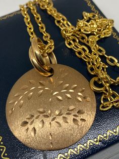 "A Lovely Vintage Gold Over 925 Sterling Silver Brushed Mat Textured Leaf Engraved Pendant/Necklace Marked on Reverse with makers Mark Italy & 925 for sterling silver  20\" Curb Link Chain Size Approx 1.5\" Diameter  Weight 13.82 grams" White Gold Etched Round Pendant Necklace, Etched Necklaces For Anniversary, Etched White Gold Round Pendant Necklace, Etched Round Necklace For Anniversary, Etched Necklace For Anniversary, Medallion Etched Necklace For Anniversary, Etched Medallion Necklace For Anniversary, Anniversary Etched Medallion Necklace, Etched Sterling Silver Round Necklace