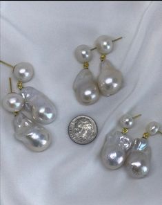 This handmade Baroque Pearl earrings is super gorgeous One of my Signature Series Collections, a bestseller, as modeled by Ms KT Reed. It is her go to earrings! Pls note, size of button pearl stud is from 10mm to 11mm, (this is what the model is wearing); pls let me know if you prefer a bigger, 12mm to 13mm or smaller pearl stud, 7mm to 8mm. Price remains the same. Available in gold plated or stainless steel, pls select. The Baroque or flameball cultured dangling pearls measure, 15mm to 17mm x 2 Pear-shaped Pearl Charm Bridal Earrings For Parties, Baroque Pearl Drop Earrings In White, Pearl White Baroque Pearl Earrings For Wedding, Pearl White Baroque Pearl Drop Bridal Earrings, Pearl White Bridal Earrings With Baroque Pearl Drop, Baroque Pearl Wedding Earrings In Pearl White, Wedding Pearl Jewelry With High Luster, Pearl White High Luster Jewelry For Wedding, Pearl White High Luster Wedding Jewelry