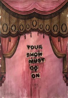 a pink curtain with the words your show must go on