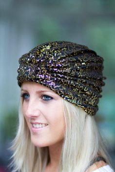 One part exotic, one part glam...this glittering, sequined, fashion turban is all parts show-stopping style!! Sparkle in the sunshine, sparkle in the disco light...this piece has it's own magic and looks as great with a simple t-shirt as it does with a festive maxi dress!! Tuck your hair up into it for a 1920's take on the item, or let your hair fall loose for a more bohemian vibe. ♥Extra stretchy; One size will fit most. ♥95% polyester; 5% spandex sequin fabric. ♥Lined with 95% Rayon; 5% spande Glamorous Party Headband, Gold Headwrap Headband For Party, Gold Turban Headband For Party, Gold Turban Style Headband For Party, Party Headband Headwrap, One Size Black Turban For Party, Party Turban Headband, Party Headwrap In Headband Style, Party Headband Headwrap One Size