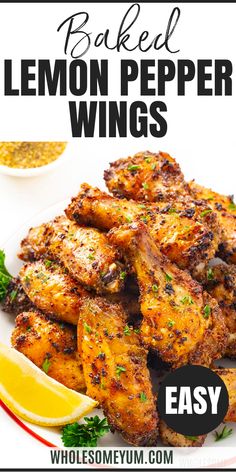 baked lemon pepper wings on a white plate