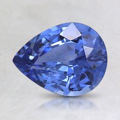 a blue diamond on a white surface