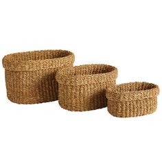 three woven baskets on white background