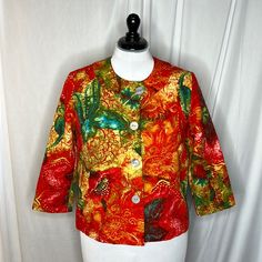 Utopian Flower Amalia Flower Jacket Orange Sz 0 (S/4). 3/4 Sleeve. Button Front. Lined. Chest 19 1/2” Waist 19 1/2” Sleeve 18 1/2” Length 23” Multicolor Spring Outerwear With Button Closure, Spring Multicolor Outerwear With Button Closure, Spring Outerwear With Button Closure And 3/4 Sleeve, Cheap Orange Outerwear With Button Closure, Fitted Orange Outerwear With Button Closure, Orange Long Sleeve Outerwear With Button Closure, Flower Jacket, Orange Floral Print Button-up Tops, Orange Long-sleeve Outerwear With Pockets