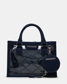 Achieve a sophisticated look with the CELESTE bag in dark blue. Crafted with dark denim, this bag features quilted stitching that adds both texture and elegance. Perfect for any occasion, this bag is the ultimate combination of style and functionality. Dark denim top-handle bag Tonal quilted stitching Removable inner pouch Detachable modular pouch Detachable crossbody strap Hidden mag closure Top handle: 4 inches Crossbody strap: 24 inches 7.5in H x 10.5in W x 4.5in D Textile and PVC materials I Denim Blue Double Handle Bag For On-the-go, On-the-go Denim Bags With Double Handle, Blue Quilted Bag For On-the-go, Navy Shoulder Bag With Detachable Top Handle, Navy Top Handle Shoulder Bag With Detachable Handle, Blue Quilted Crossbody Bag, Chic Blue Quilted Shoulder Bag, Chic Blue Quilted Bag, Trendy Blue Quilted Bag