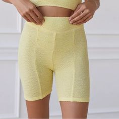 An Essential Pair Of Bike Shorts In A Textured Knit By Out From Under. Bodycon Fit. High-Rise. Topped With A Wide Waistband. Only At Uo. Content + Care - 93% Rayon, 5% Nylon, 2% Spandex - Machine Wash - Imported Fitted Yellow Shorts For Loungewear, High Stretch Biker Shorts For Summer Loungewear, Yellow Fitted Short Length Activewear, Casual High Stretch Yellow Bottoms, Urban Outfitters Stretch Short Bottoms, Casual Yellow Fitted Biker Shorts, Casual Fitted Yellow Biker Shorts, Urban Outfitters Stretch Shorts, Stretch Shorts From Urban Outfitters