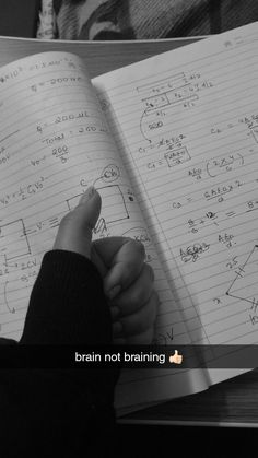 someone is writing on a notebook with the caption'brain not training'in front of them