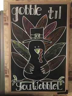 a chalk board with a turkey wearing a top hat on it's head and the words jobble till youth