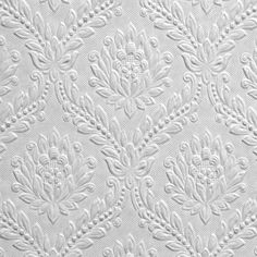 an intricate white wallpaper pattern