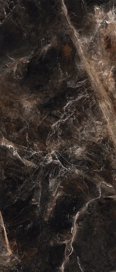 an abstract marble pattern with brown and black colors