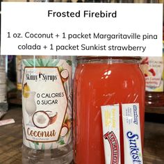 two jars of frozen drink next to each other on a wooden table with text overlay that reads frosted firebird 1oz coconut + 1 packet margarita