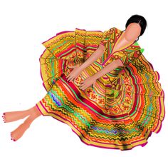 a woman in a colorful dress is laying on the floor with her legs spread out