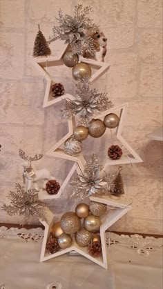 a christmas tree made out of star shaped ornaments