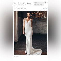 a woman in a white wedding dress standing on a wooden floor