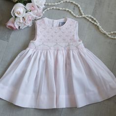 This Adorable Baby Girl's Dress In Size 6 Months Is Precious! Perfect For Spring! The Entire Front Bodice Is Done In A Lattice Smocking With Adorable Little Floral Bullion Rosebuds Evenly Spaced Throughout The Lattice Design. Just Above The Waist Has An Accordion Row Of Smocking With A Pink And White Embroidered Border. A Pink, White And Green Floral Vine Is Embroidered Across The Accordion Smocking. Gorgeous Details! This Dress Was Bought New And Never Worn. Perfect Condition! Nwot Friedknit Cr Smocked Dresses Baby Girl, Spring Sleeveless Baptism Dress, Fitted Sleeveless Cotton Baptism Dress, Sleeveless Cotton Baptism Dress For Spring, Sleeveless Cotton Baptism Dress, Fitted Sleeveless Pink Baptism Dress, Pink Fitted Smocked Dress For Baptism, Pink Smock Dress For Baptism, Lattice Smocking