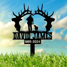 a metal sign that says david james with antlers on it