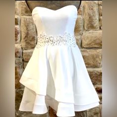 Dress White Lace Waist Strapless Dress Size 13-14 New With Tags White Strapless Dress For Summer Prom, White Strapless Summer Prom Dress, Strapless Mini Dress For Summer Homecoming, Spring Homecoming Strapless Dress, White Strapless Dress With Sweetheart Neckline For Homecoming, White Sleeveless Dress For Homecoming, White Sleeveless Homecoming Dress, White Mini Dress For Summer Homecoming, White Strapless Dress For Night Out