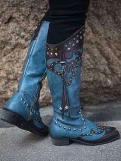 Embrace your country roots with these vibrant cowboy boots boasting an edgy boot harness and intricate studded. A sturdy rubber sole ensures a confident step. 1.8" heel Zip closure 13.2'' shaft 15.8'' circumference Man-made PU upper Man-made lining Man-made footbed Man-made midsole Rubber sole Edgy Boots, Reindeer Headband, Blue Boots, Cowboy Boots Women, Western Boots, Biker Boot, Chunky Heels, Knee High Boots, High Boots