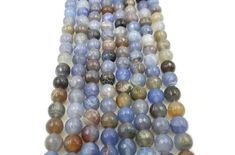 multicolored agate beads are stacked together