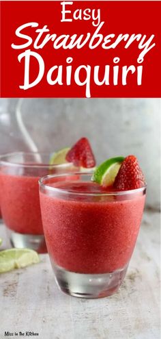 two glasses filled with raspberry daigurt on top of a table