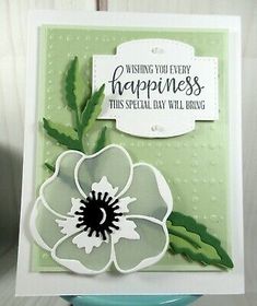 a card with a flower on it