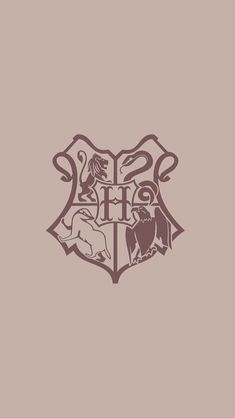 the hog potter crest on a brown background with an image of two hog potters