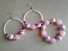 Earring and bracelet set that I made using white pearl beads, pink pearls, pink and white swirl bead mix, and metal spacers. Pink Round Pearl Beads, Pink Pearl Beads For Jewelry Making, Handmade Pink Pearl Beads, Adjustable White Beaded Bracelets With Dangling Beads, Pink Pearl Beaded Bracelets For Jewelry Making, White Beaded Bracelets With Dangling Beads, Pink Jewelry With Spacer Beads For Jewelry Making, Adjustable White Hoop Earrings With Colorful Beads, Gift White Hoop Earrings With Colorful Beads