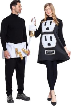 a man and woman dressed up in costumes