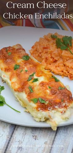 a white plate topped with cheesy chicken enchiladas next to rice