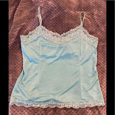 Have The Perfect New Top Ready For Spring And Summer! Gorgeous Perfect Condition Blue Turquoise Lace Cami Szm With Built In Shelf Bra And Cool Adjustable Spay Straps. Love This Too Because It Has The Lace All Around And Not Just On The Front Like Many Do. Only Getting Rid Of It Because I Feel It Is Too Lose On Me And Never Go Anywhere To Wear It Anymore. Can Be Worn Under A Suit Or With A Dress Pant Or Skirt Or On A Date Night With Jeans. Is A Szm. Also Have This In Color Purple As Shown In Last Blue Camisole Top With Lace Trim, Blue Lace Trim Camisole Top, Blue Lace Trim Camisole For Summer, Fitted Blue Camisole With Lace Trim, Blue Lace Trim Camisole, 2000s Outfit, Princess Vibes, Visual Archive, Turquoise Lace