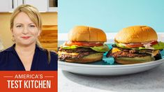 a woman standing in front of two hamburgers on a white plate with the caption america's test kitchen