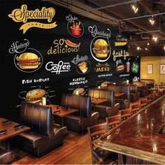 the interior of a fast food restaurant with many menus on the wall and wooden tables