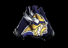 an image of a football glove that is painted with the logo of the minnesota wolverines