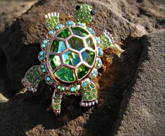 THE MAGICKAL LUCKY LOTTERY WINNING TURTLE! This beautiful brooch is packed full of luck spells specifically for drawing wealth. Turtles are symbols of good fortune and miraculous blessings. They bring hope by showing you that they can survive during hard times of lack and drought until things improve for the better. That is what they will do for you, as your luck is getting ready to change. Simply reading this listing will bring you a dose of quick luck. Imagine if you owned this piece?? It has Unique Green Brooches As Gifts, Unique Green Brooch For Gift, Unique Green Brooches For Gifts, Green Pendant Brooch For Gift, Spells For Wealth, Lottery Winning, Luck Spells, Turtle Brooch, Tortoise Turtle