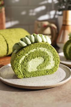 This matcha roll cake is made with a soft and fluffy matcha cake sheet that never rips when rolled and filled with matcha whipped cream for double the matcha green tea flavour. #matcha #swissroll #rollcake | teakandthyme.com Matcha Deserts, Matcha Whipped Cream, Matcha Frosting, Japanese Roll Cake, Matcha Roll Cake, Cake Matcha, Matcha Desserts, Matcha Baking, Green Tea Dessert