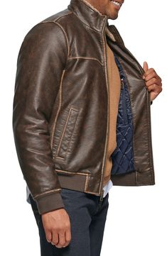 Ultrasoft faux-shearling lining offers ultimate warmth into this faux-leather jacket styled with handy pockets. 27" length Front zip closure Stand collar Front welt pockets Water resistant Lined, with synthetic fill 100% polyurethane with 100% polyester faux shearling Machine wash, tumble dry Imported Brown Fits, Leather Jacket Style, Nordstrom Store, Faux Leather Jackets, Jacket Style, Welt Pockets, Welt Pocket, Stand Collar, Nordstrom Rack