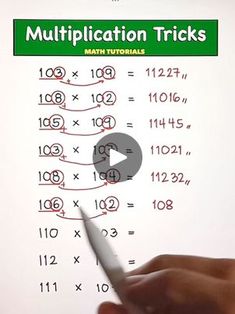 a hand is holding a pen and pointing to a math trick