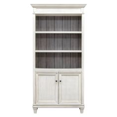 a white bookcase with two doors and drawers