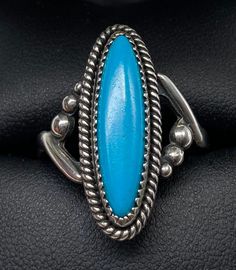 Beautiful Estate Jewelry Vintage Sterling Silver Southwest Native with Natural Perfect Blue Turquoise Ring Size 10 good pre/owned condition. Collectible Round Turquoise Ring, Oval Blue Southwestern Jewelry, Southwestern Blue Oval Jewelry, Blue Oval Southwestern Jewelry, Handmade Blue Turquoise Ring For Collectors, Collectible Untreated Blue Turquoise Ring, Southwestern Style Blue Oval Jewelry, Classic Blue Turquoise Ring Stamped 925, Classic Turquoise Ring For Collectors