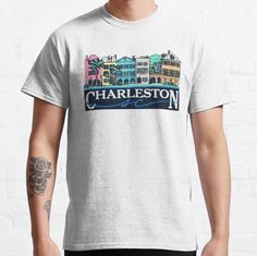 Standard fit with double-needle hems for durability. Solid colors are 100% preshrunk cotton, heather colors are cotton blend. Range of colors available, with the option to print on front or back. Size range S-3XL, suitable for men and women. A vintage style Charleston, South Carolina design to show your Charleston love! Casual Heather Grey T-shirt With Graphic Print, Casual Heather Grey Pre-shrunk T-shirt, Casual Pre-shrunk Heather Grey T-shirt, Rainbow Row, Pride Merch, Charleston South Carolina, Male Model, South Carolina, Charleston