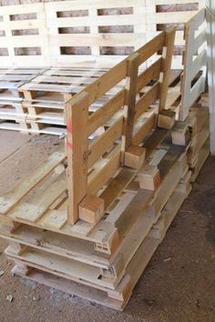 several wooden pallets stacked on top of each other