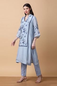 Powder blue kurta with floral print and thread embroidery. Paired with coordinating straight pant. - Aza Fashions V-neck Kurta With Chikankari Embroidery For Spring, Spring V-neck Kurta With Chikankari Embroidery, Blue Embroidered V-neck Set, Blue Floral Print V-neck Kurta, Blue Chikankari Embroidery V-neck Kurta, Blue V-neck Kurta With Printed Motifs, Blue Kurta With Intricate Embroidery For Spring, Blue Embroidered Kurta For Spring, V-neck Kurta With Floral Embroidery For Spring