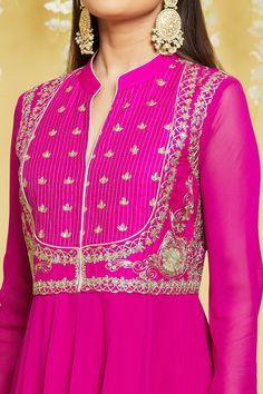 Pink silk flared anakali kurta adorned with dori embroidery on bodice. Comes with matching plain churidar and sequined dupatta.
Components: 3
Pattern: Embroidered
Type Of Work: Gota, Dori
Neckline: Mandarin Collar
Sleeve Type: Churidar
Fabric: Silk
Color: Pink
Other Details: 
Threadwork placket
Pleated flared anarkali waist
Buttoned kurta cuff
Occasion: Wedding,Sangeet - Aza Fashions Festive Resham Embroidered Anarkali Set, Festive Resham Embroidery Anarkali Set, Anarkali Sets With Dori Work And Straight Kurta, Floor-length Semi-stitched Kurta With Resham Embroidery, Semi-stitched Floor-length Kurta With Resham Embroidery, Floor-length Semi-stitched Resham Embroidery Kurta, Designer Semi-stitched Anarkali Set With Resham Embroidery, Designer Semi-stitched Resham Embroidered Anarkali Set, Anarkali Kurta With Resham Embroidery In Chinon