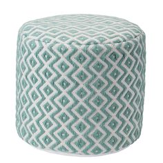 a blue and white poufce with diamond pattern