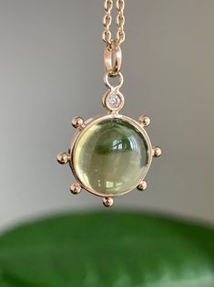 "Please, read full description! Please, don't rely on your expectations, the exact size is described below  14k solid yellow gold, lemon (olive) quartz and natural white diamond mini pendant, \"Sun\" 🌞 Chain is NOT INCLUDED!  All metal components are solid 14k yellow gold, not a plating, not a goldfill, pendant will not change color over time  The lemon quartz is 10mm diameter, 5.1mm thick. Quartz weight is 4.1 carats. Quartz has natural internal lines, spots and inclusions, it doesn't compromi Colorful Clothing, Pendant Necklace Simple, Sun Pendant, Bottle Jewelry, Cabochon Pendant, Necklace Simple, Lemon Quartz, Yellow Gold Chain, Pendant Rings