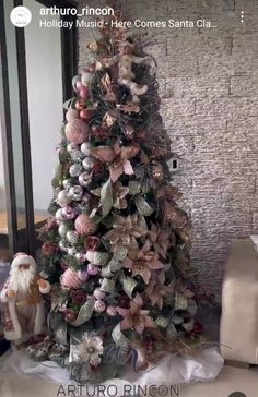 a decorated christmas tree in the corner of a room