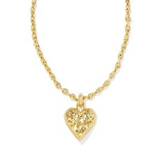 Sweet, always-on-trend, and full of shine, you can't help but fall for the Romy Statement Heart Necklace. Centered on a textured chain, this oversized heart pendant is the pop of personality your layered look needs. Designer, founder, and philanthropist Kendra Scott started her company in 2002, just three months after her first son was born. Her commitment to innovation, quality, customer service, and detail has taken her from a small startup to a billion-dollar brand. Kendra Scott is known for Kendra Scott Heart Necklace Clear, Bat Mitzvah Party, Gold Heart Necklace, Accessories Jewelry Necklace, Gold Pendant Necklace, Layered Look, Heart Pendant Necklace, Kendra Scott, Cute Jewelry