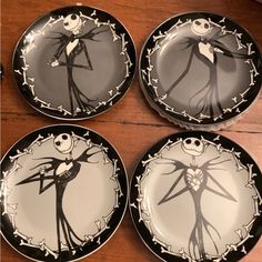 four black and white plates with the characters jack skellingy from the animated movie